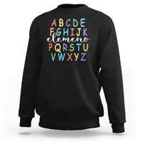Black sweatshirt with colorful alphabet graphic, crew neck and long sleeves