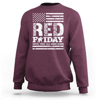 Maroon crewneck sweatshirt with U.S. flag and “Remember Everyone Deployed” memorial graphic