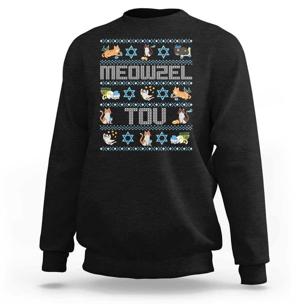 Black crewneck sweatshirt with playful Hanukkah cat and menorah graphic