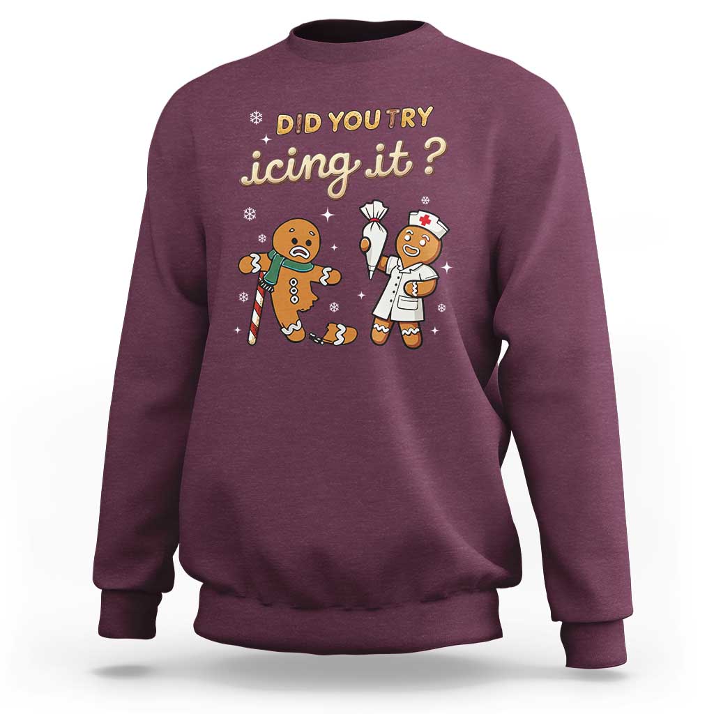 Maroon Christmas nurse sweatshirt with gingerbread nurses graphic, Did you try icing it?
