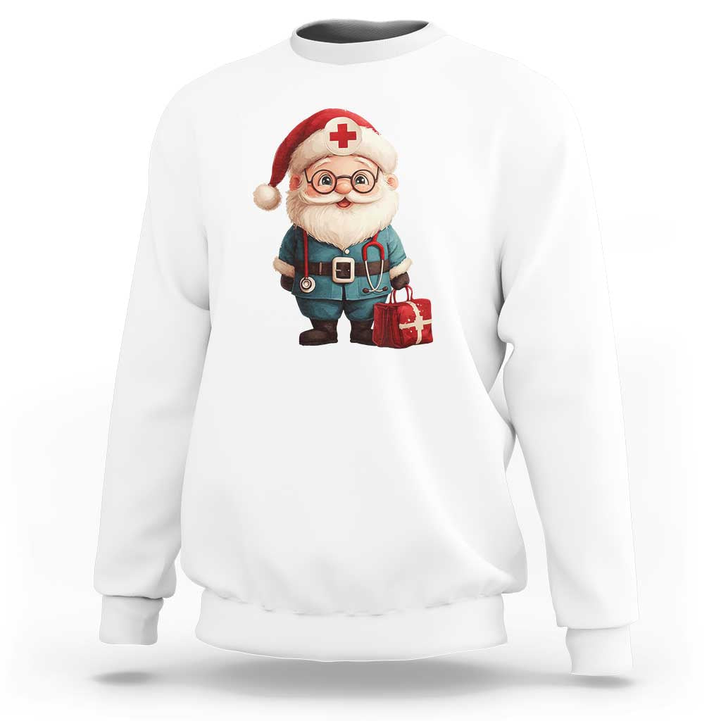 White crewneck sweatshirt with Santa doctor graphic and red cross medicine badge