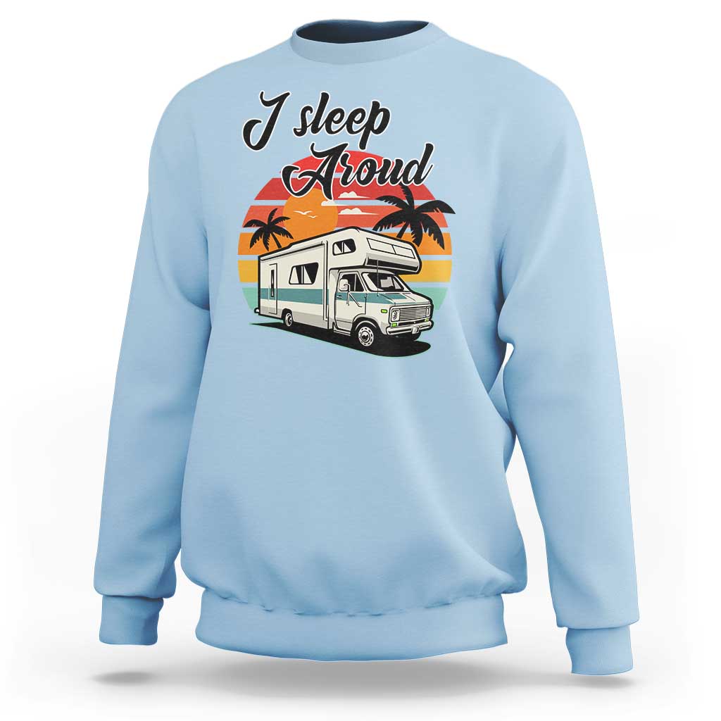 Light blue camping crewneck sweatshirt with "I Sleep Proud" camper van graphic