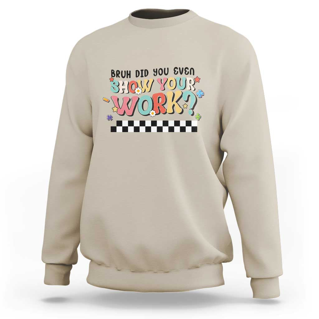 Beige sweatshirt with colorful 'Show Your Work' text and checkered banner