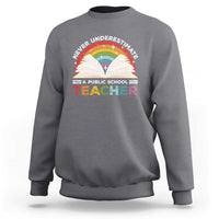 Dark heather gray sweatshirt with rainbow teacher graphic on front and crew neckline