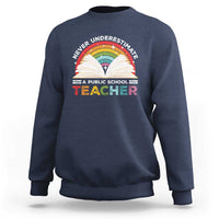 Navy sweatshirt with rainbow teacher graphic on front and crew neckline