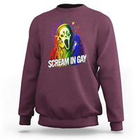 Maroon crewneck sweatshirt with rainbow ghost graphic and 'SCREAM IN GAY' text