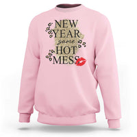 Light pink sweatshirt with “NEW YEAR same HOT MESS” graphic and red lips on front