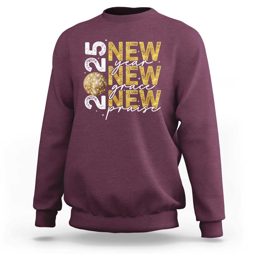 Maroon sweatshirt with front graphic text and gold glitter globe