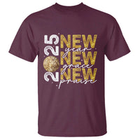 Maroon T-shirt with “New Year New Grace New Praise” graphic and gold globe
