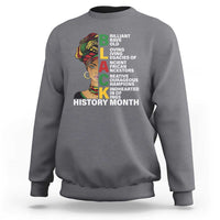 Charcoal gray crewneck sweatshirt with multicolor African-inspired portrait and History Month text