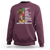 Maroon crewneck sweatshirt with multicolor African-inspired portrait and History Month text