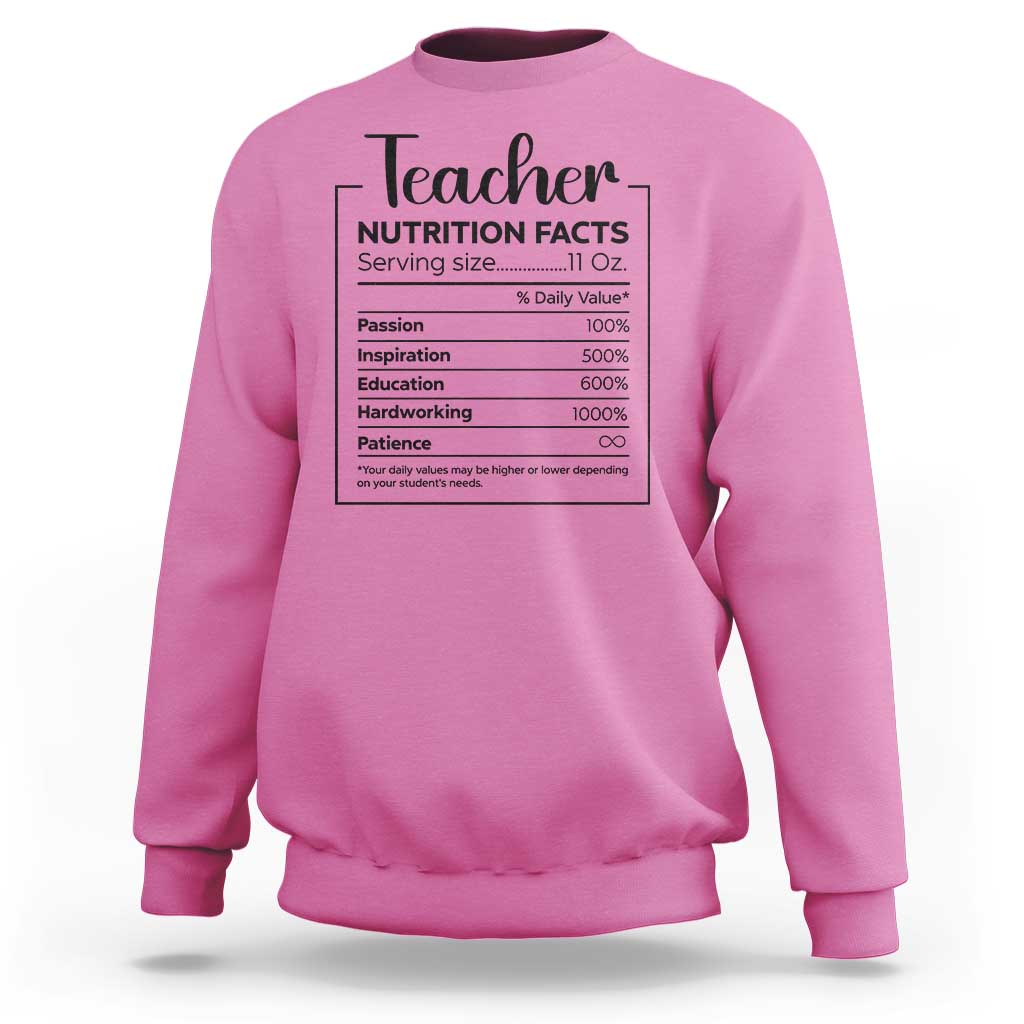 Teacher sweatshirt in azalea pink with a nutrition facts style graphic on chest