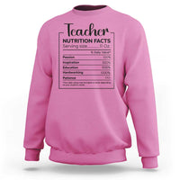 Teacher sweatshirt in azalea pink with a nutrition facts style graphic on chest