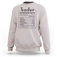 Teacher sweatshirt in sand with a nutrition facts style graphic on chest