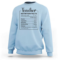 Teacher sweatshirt in light blue with a nutrition facts style graphic on chest