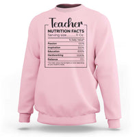 Teacher sweatshirt in light pink with a nutrition facts style graphic on chest
