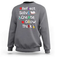 Back-to-school sweatshirt in charcoal with colorful motivational quote graphic on front