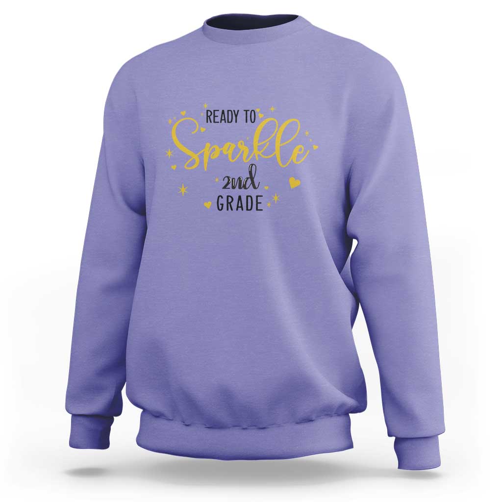 Violet crewneck sweatshirt with “Ready to sparkle 2nd grade” glitter-style design
