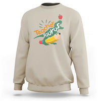 Sand beige sweatshirt with Teacher Saurus dinosaur graphic and pencil, crew neck