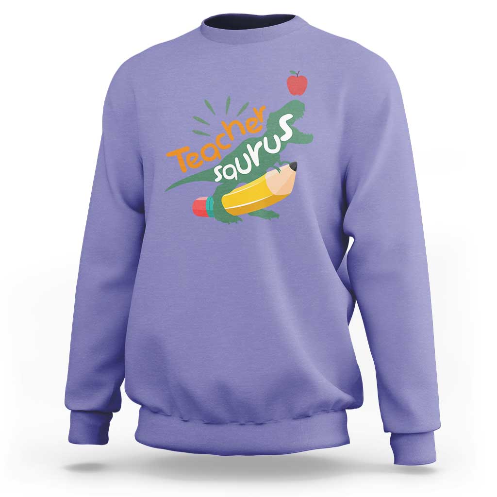 Violet sweatshirt with Teacher Saurus dinosaur graphic and pencil, crew neck