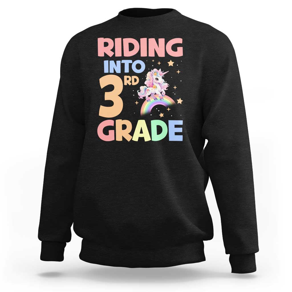 Black sweatshirt with unicorn rainbow “Riding into 3rd Grade” front print
