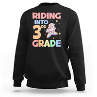 Black sweatshirt with unicorn rainbow “Riding into 3rd Grade” front print