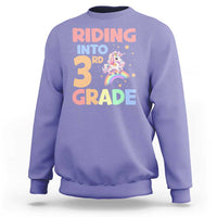 Purple sweatshirt with unicorn rainbow “Riding into 3rd Grade” front print