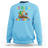 Kids light cyan sweatshirt with “I DIG” dinosaur construction graphic and “KINDERGARTEN” text