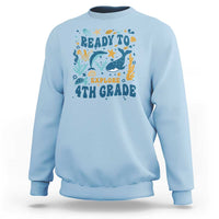 Light blue sea-animal 4th grade sweatshirt with “Ready to Explore” front graphic