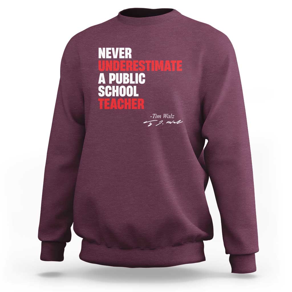 Maroon crewneck sweatshirt with centered "Never Underestimate" teacher graphic