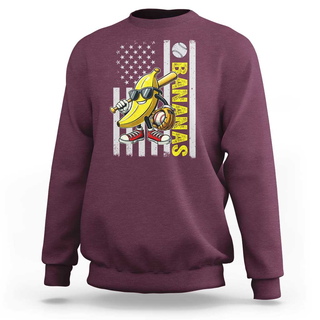 Maroon crewneck sweatshirt with banana character and American flag graphic on front