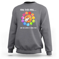 Charcoal crewneck sweatshirt with colorful dot rocket graphic on the back