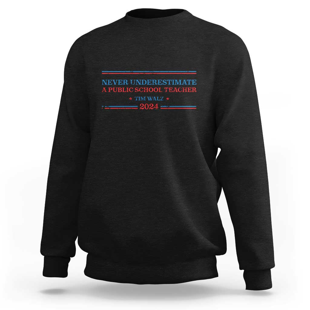 Black crewneck sweatshirt with Never Underestimate teacher graphic on chest