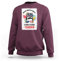 Maroon unisex sweatshirt with teacher-themed graphic print on the back