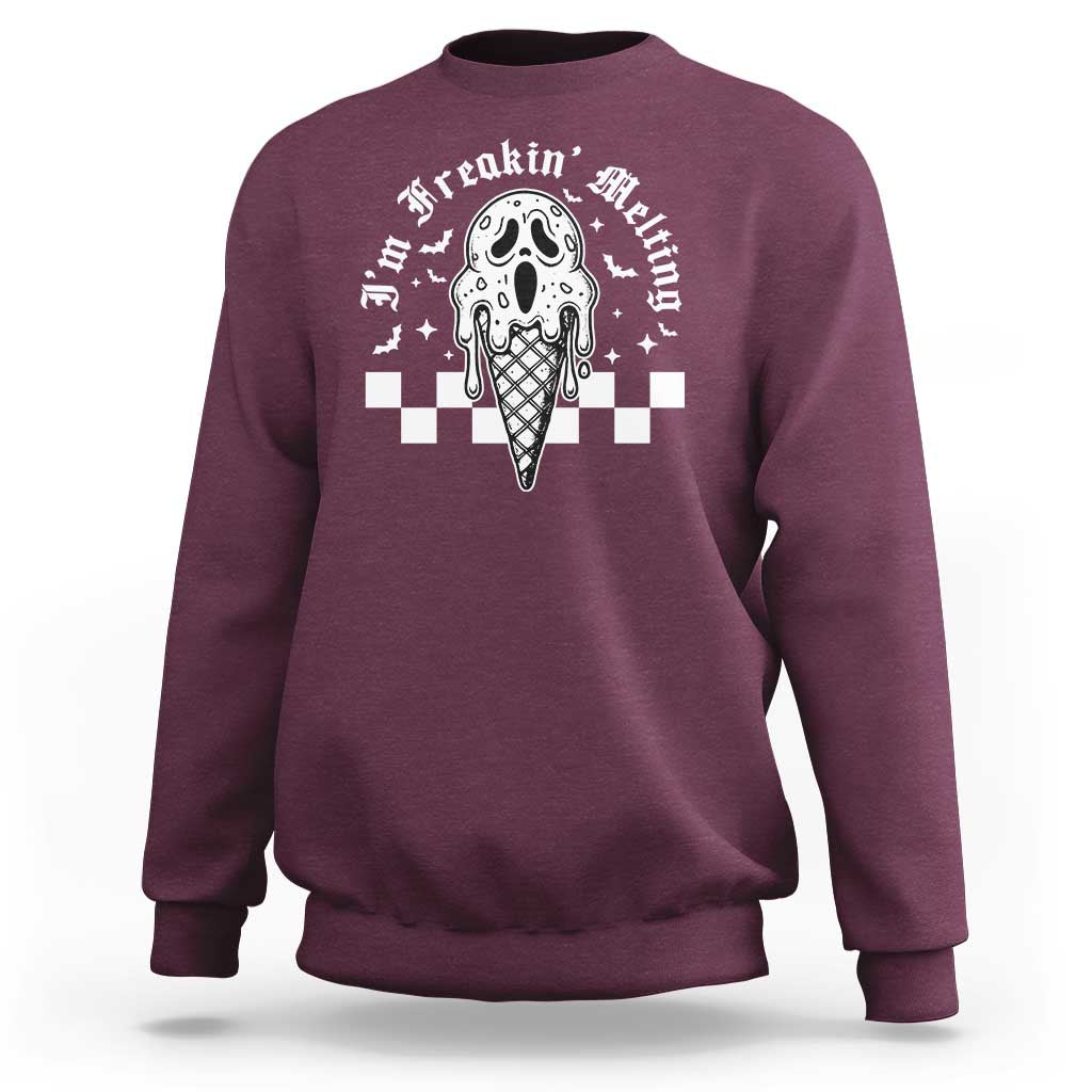 Maroon Halloween graphic sweatshirt with melting ice cream scream and bat design