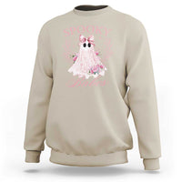 Sand Halloween sweatshirt with pink ghost graphic, bow, and floral accents on front.