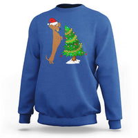 Royal blue wiener dog Christmas sweatshirt with Santa hat and decorated tree graphic