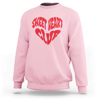 Light pink crewneck sweatshirt with red “Sweet Heart Club” heart graphic on chest