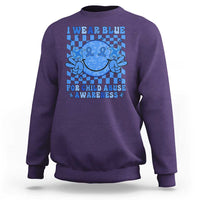 Purple crewneck sweatshirt with blue awareness graphic on back