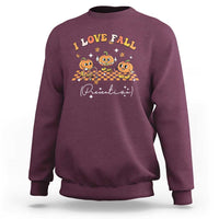 Maroon crewneck sweatshirt with “I Love Fall Prevention” fall-themed pumpkin graphic