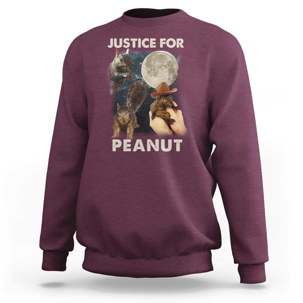 Maroon sweatshirt with front graphic of squirrels and “JUSTICE FOR PEANUT” text