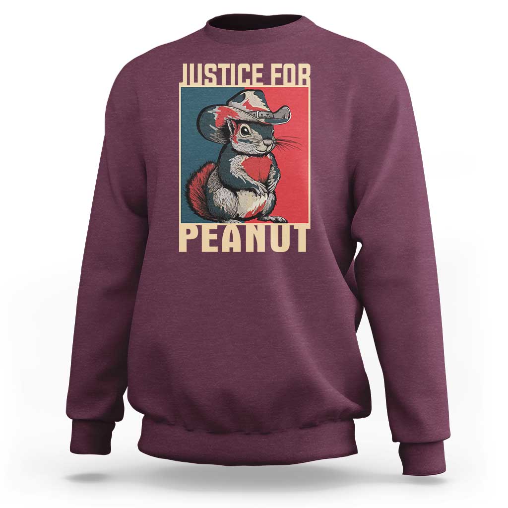 Maroon crewneck sweatshirt with back squirrel graphic and 'JUSTICE FOR PEANUT'