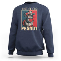 Navy crewneck sweatshirt with back squirrel graphic and 'JUSTICE FOR PEANUT'