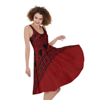 Sleeveless midi dress with red skirt and black geometric Polynesian print, scoop neck