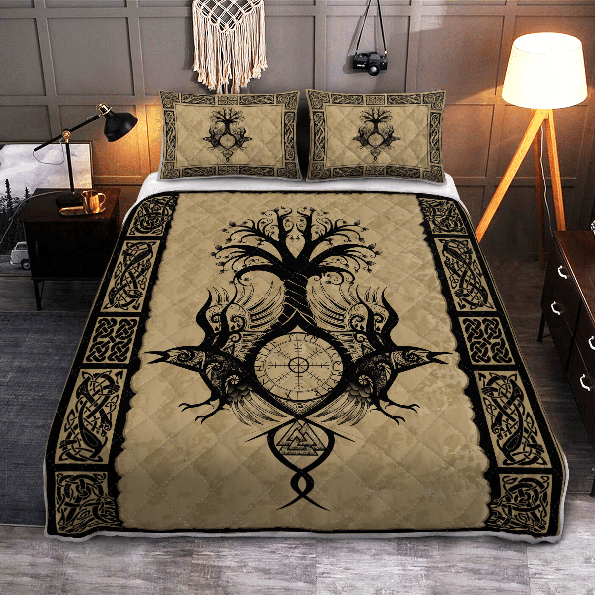Quilt bed set with raven and Yggdrasil graphic, beige quilt with black ornamental border.