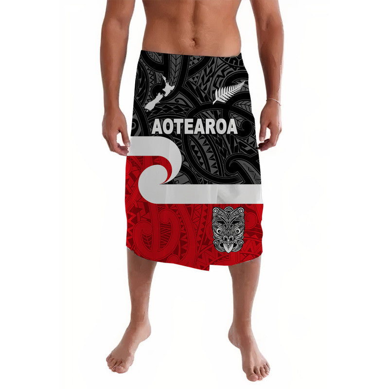Black and red patterned lavalava skirt with elastic waistband and bold face graphic
