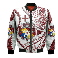 White bomber jacket with red, blue graphic crest and zipper, black ribbed cuffs