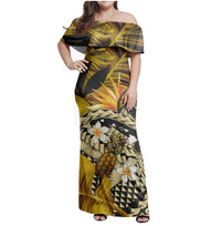 Tropical off-shoulder maxi dress, black and gold print with pineapples and hibiscus