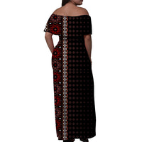 Back view of women’s off-shoulder long dress, black with red panel and patterned vertical trim