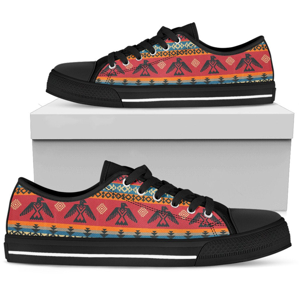 Low-top canvas sneakers with colorful native-style geometric print, black sole and laces